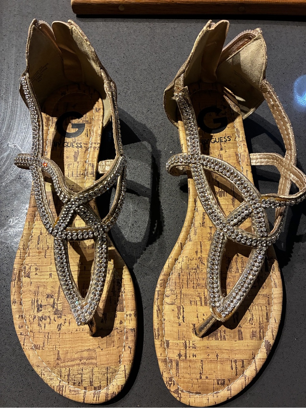 By GUESS Gold Rhinestone Cork-Style T-Strap Sandals
